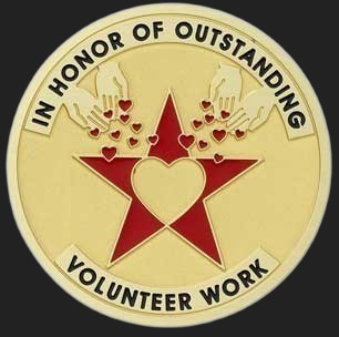 Metal Stickems 2-inch gold-tone volunteer recognition sticker with a red star, heart motif, and engraved text.