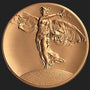 Metal Stickems 2-inch circular metal sticker featuring a high-relief Winged Victory design in a bronze metallic finish.